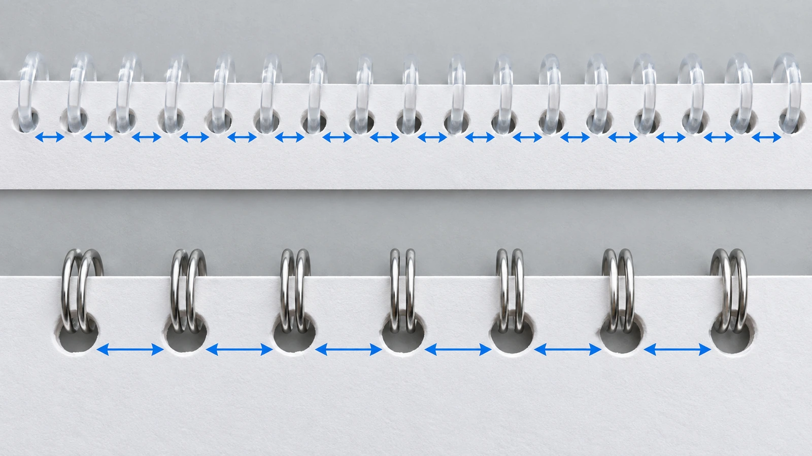 Side-by-side comparison of a densely punched notebook edge and a widely spaced punched edge, illustrating different coil binding pitches