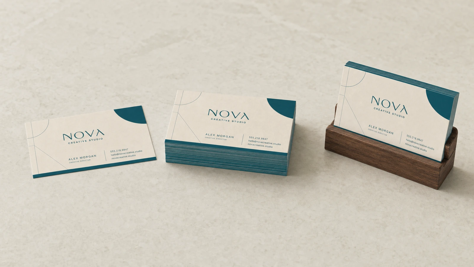Business cards grouped by artwork version beside protective packaging and a repeat-order reference sample