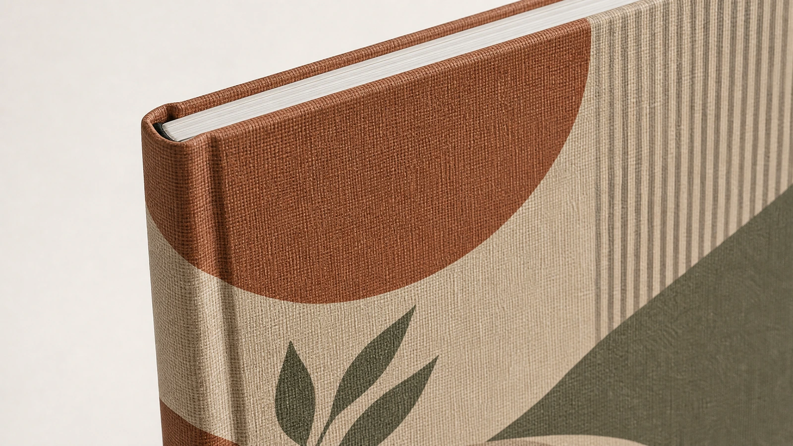 Surface finishes and notebook closure concepts for sampling Concept study of linen cover decoration and an optional rear-anchored elastic notebook closure