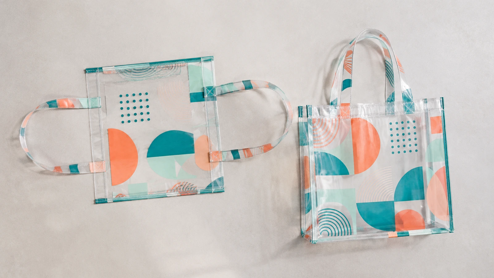Clear tote sample with width height and depth guides beside a restrained single-side logo layout