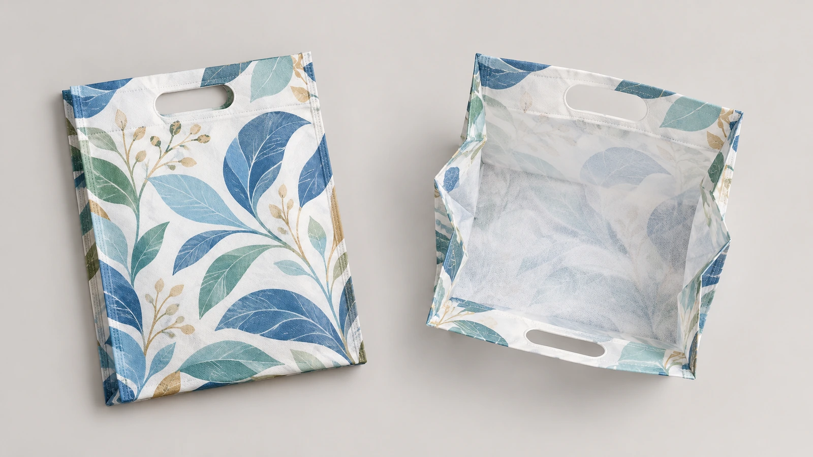 D-cut bag sizes and logo readability Three D-cut non-woven bag sizes laid flat with a ruler showing logo print area