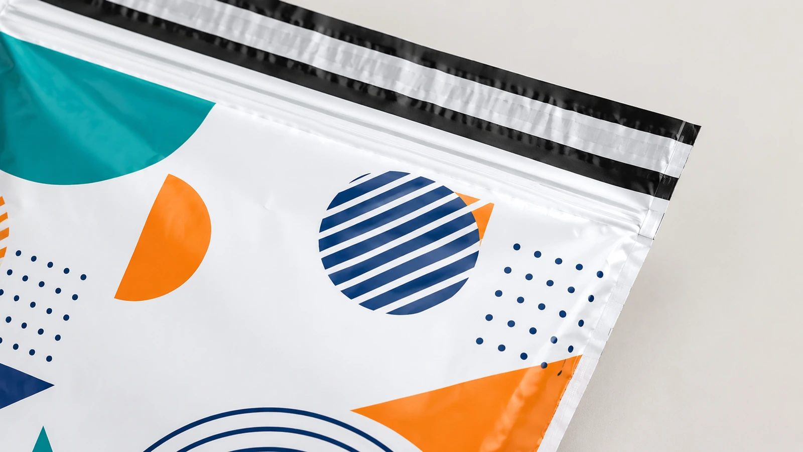 Illustrative front print area and rear flap with separate outbound and return adhesive liners