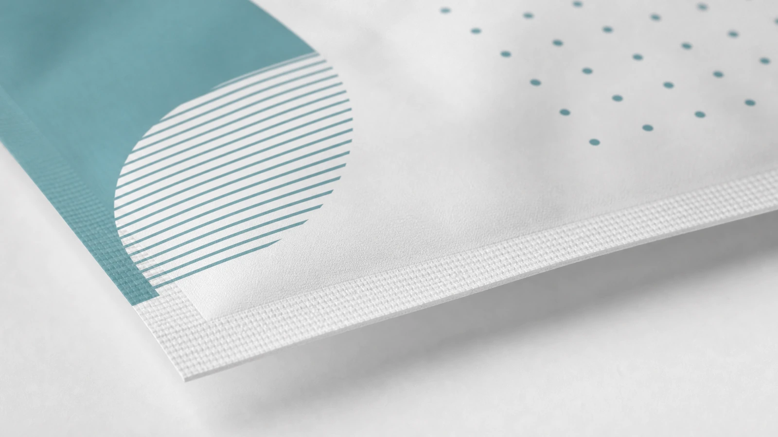 Surface finishes and pouch-appropriate closure concepts Matte and gloss pouch surfaces with reverse-side views, tear notches, and an optional zipper closure